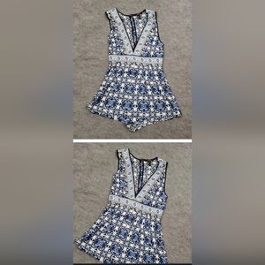 Forever 21 cute bohemian pattern romper shorts. Sexy low v-neck in size M.